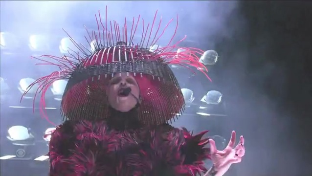 Lady Gaga Performs 'Abracadabra' in a Fiery Red Dress and Cyclops Head Gear  :: Grabien - The Multimedia Marketplace